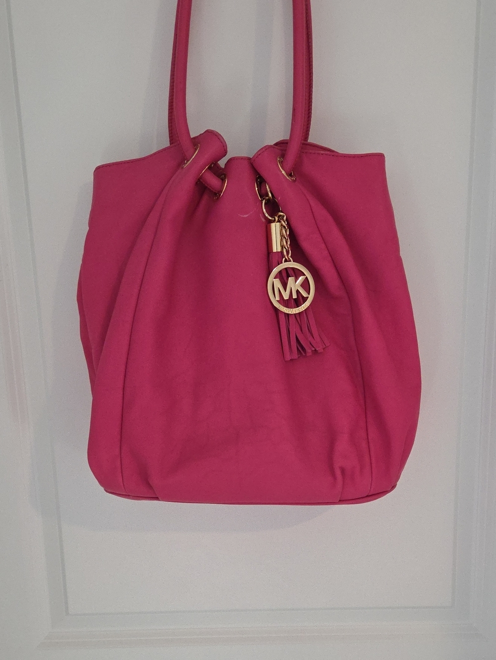 Michael Kors Hot Pink Drawstring Shoulder Bag with MK Tassel